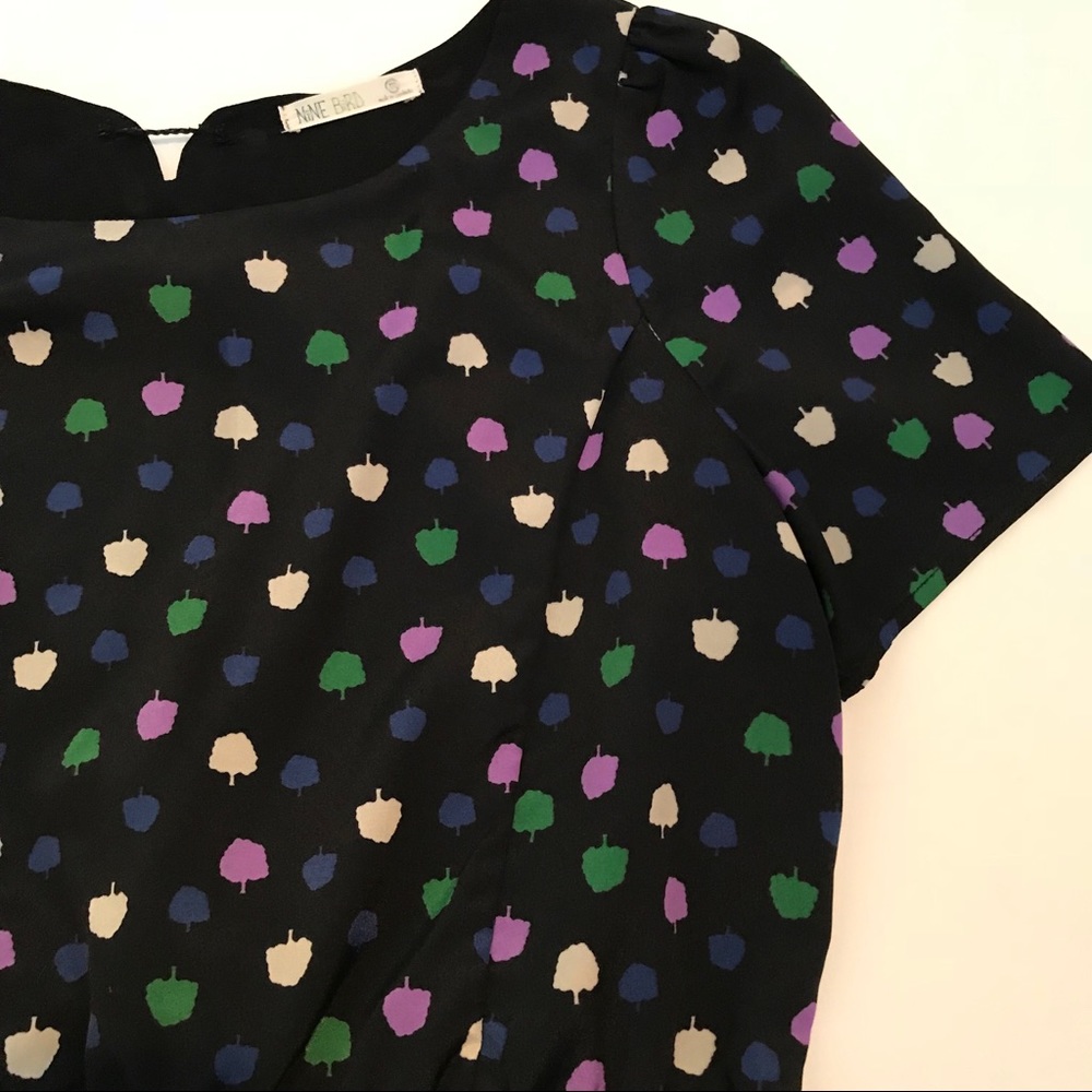 Whimsical peplum top with quad-color-tree print